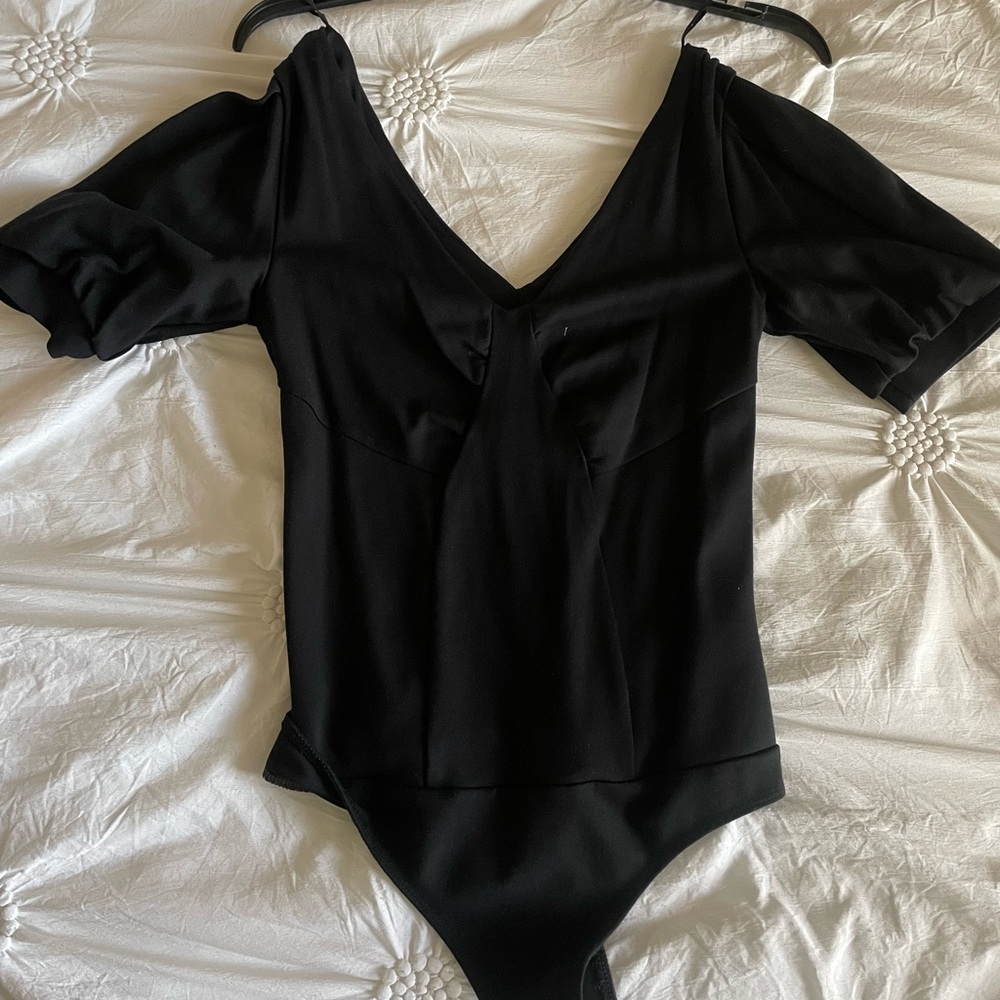 Black express body suit worn once like new